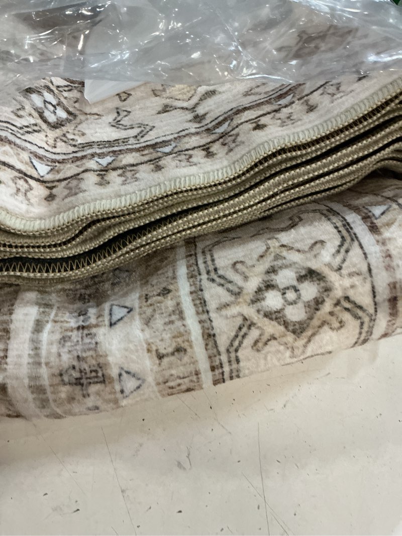 Condition photo showing New/Like New for 7x9 washable area rug, vintage rugs for living room, beige | non slip carpet for bedroom, dining room, nursery, stain resistant soft low pile foldable kid & pet friendly home decor beige 7' x 9' (rectangular)