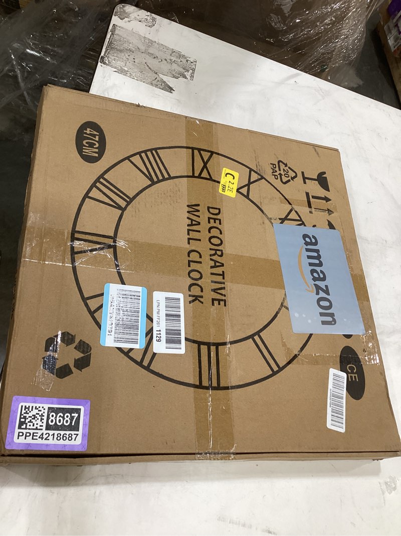 Condition photo showing New/Like New for decorative wall clock