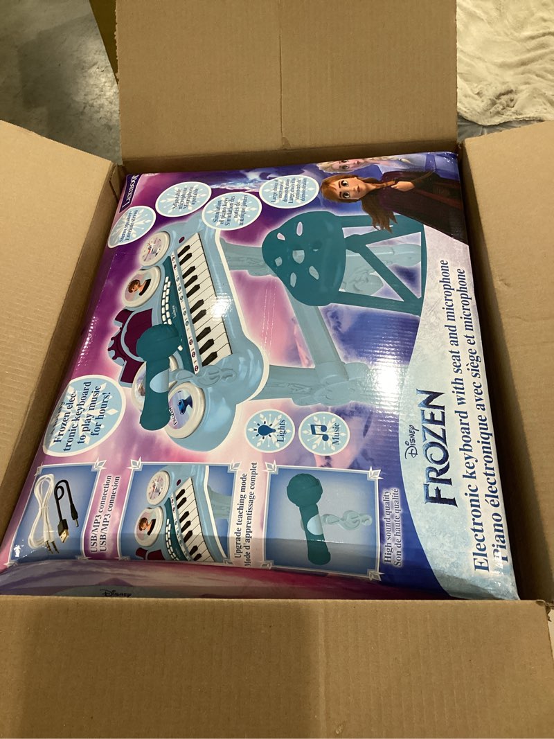 Condition photo showing Good Condition for lexibook, frozen, electronic keyboard with seat, microphone, mp3 player, sound effects, demo tunes, blue/purple, k707fz