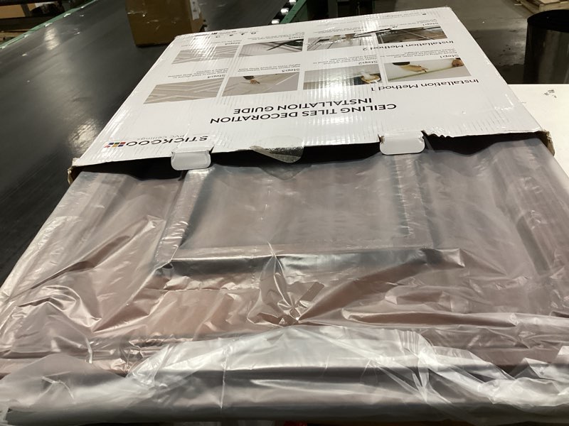 Condition photo showing Good Condition for STICKGOO Glue Up Ceiling Tiles, 24x24 Inch PVC Decorative Drop Ceiling Tile Antique Copper 48 Sq. Ft, Pack of 12 Tiles 24"x24" Antique Copper