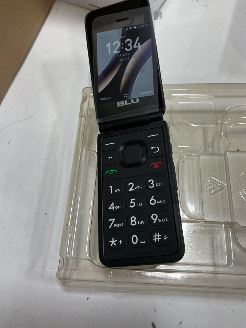 Condition photo showing As Is for straight talk blu flex flip phone, 8gb, 4g, black - prepaid feature phone [locked to straight talk]. *** working condition verified. no network or connectivity tests were performed. bidder be advised ***