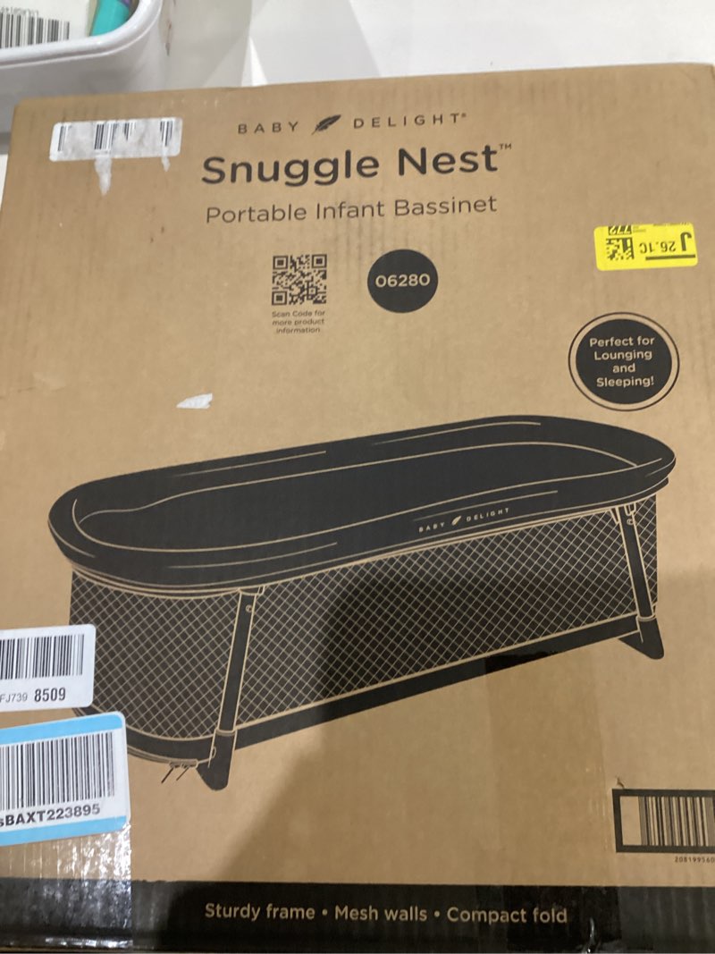 Condition photo showing New/Like New for Baby Delight Snuggle Nest Bassinet, Portable Baby Bed, for Infants 0 – 5 Months, Driftwood Grey