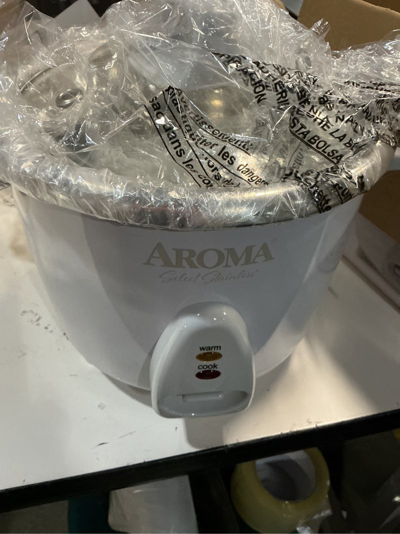 Condition photo showing New/Like New for Aroma Housewares Select Stainless Rice Cooker & Warmer with Uncoated Inner Pot, 14-Cup(cooked) / 3Qt, ARC-757SG 14-Cup(cooked) / 3Qt.