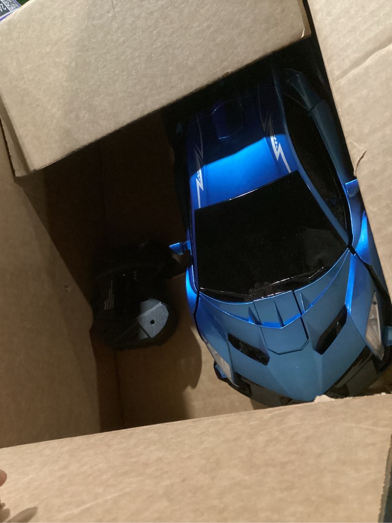 Condition photo showing As Is for V991 Transform Remote Control Car, 1:10 Big Size, 2 Rechargeable Batteries for 70Min, 2.4GHz Gesture Sensing, One-Key Deformation, Robot Toys Gifts for Boys and Girls (Blue)