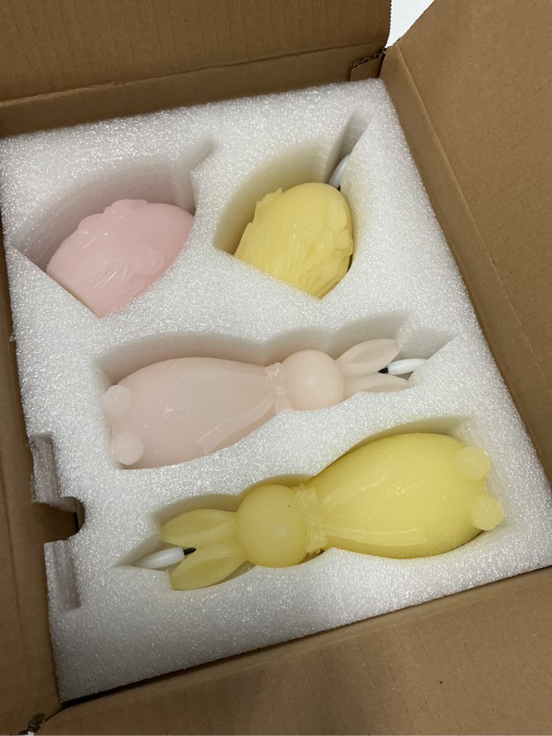 Condition photo showing New/Like New for wds wondrous easter flameless candles set of 4, led bunny & egg candles with floral embossed design, pink & yellow battery operated candle for home decor, gift for women, mom, easter decor pink and yellow