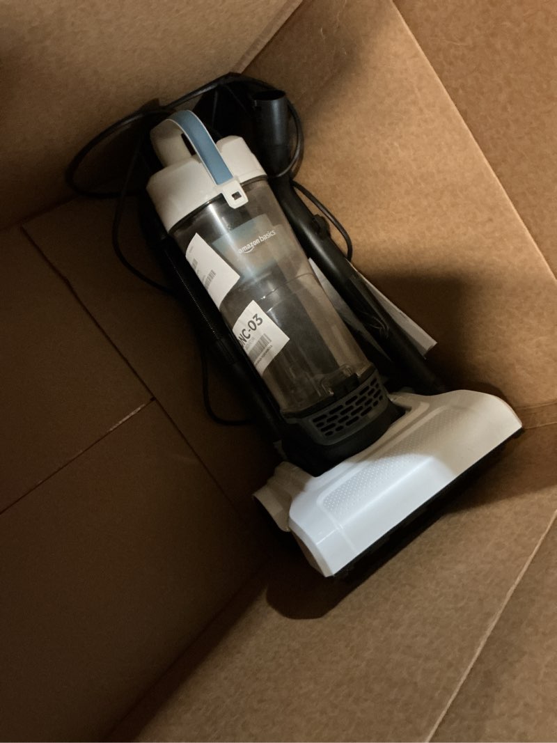 Condition photo showing As Is for amazon basics upright bagless vacuum cleaner for carpet and hard floors, washable filter, crevice and upholstery tools, detachable handle, lightweight, 1.7l dust cup, 25ft cord, black/white