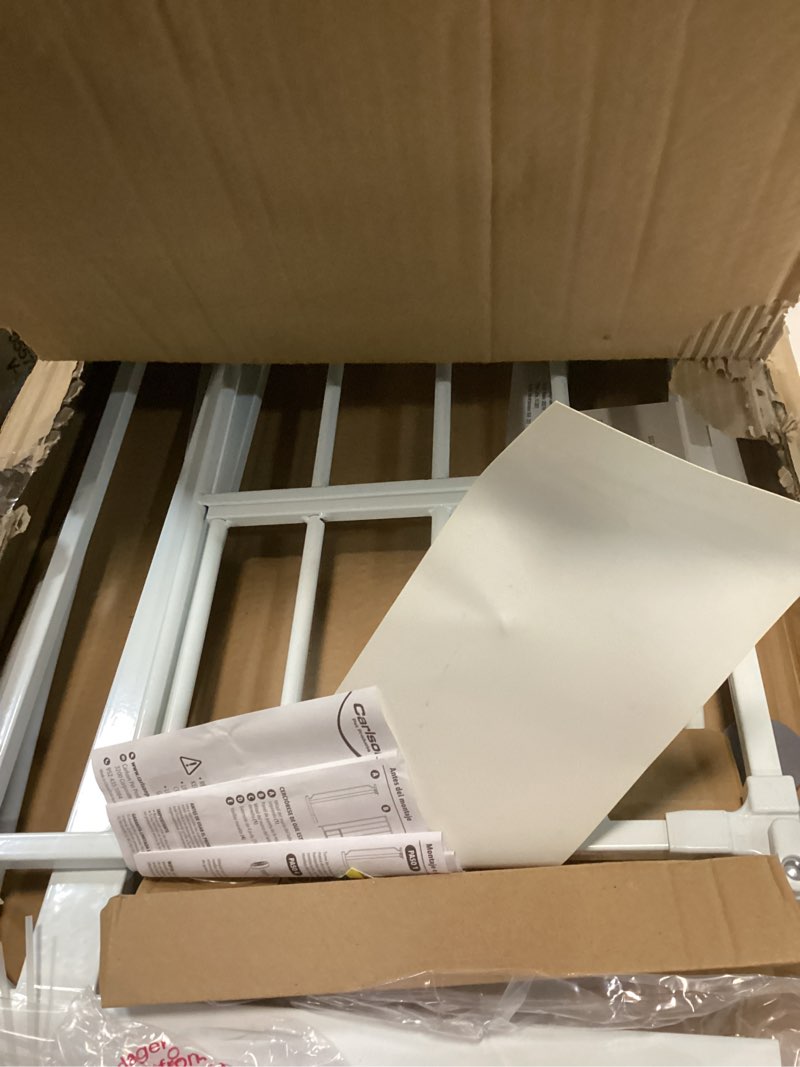 Condition photo showing As Is for Carlson Extra Wide Walk Through Pet Gate with Small Pet Door, Includes 4-Inch Extension Kit, Pressure Mount Kit and Wall Mount Kit, White