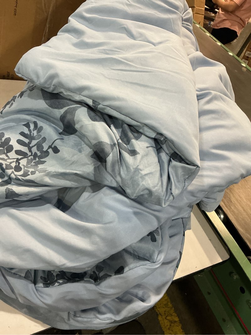 Condition photo showing As Is for mainstays soft touch bed in a bag 11-piece reversible blue floral comforter set with sheets, queen