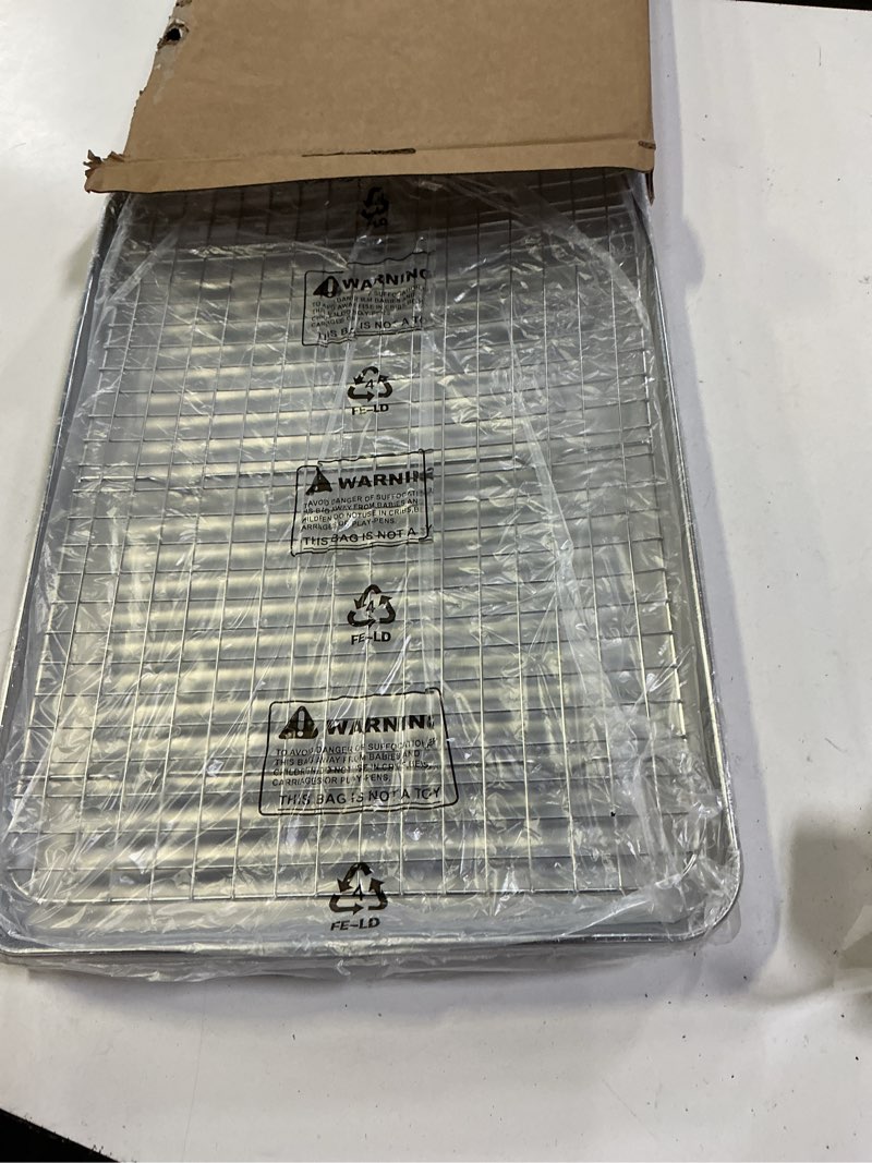 Condition photo showing New/Like New for rottay baking sheet, half sheet pan with cooling rack set [2 pans + 2 racks], stainless steel baking pan for oven, warp resistant & heavy duty & rust free, size 18 x 12 x 1 inches