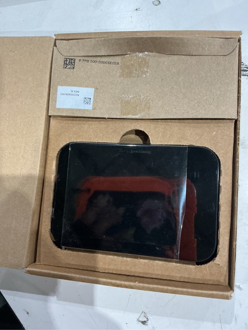 Condition photo showing As Is for incomplete  honeywell home x8s built in wifi heating and cooling touch screen smart-enabled programmable thermos