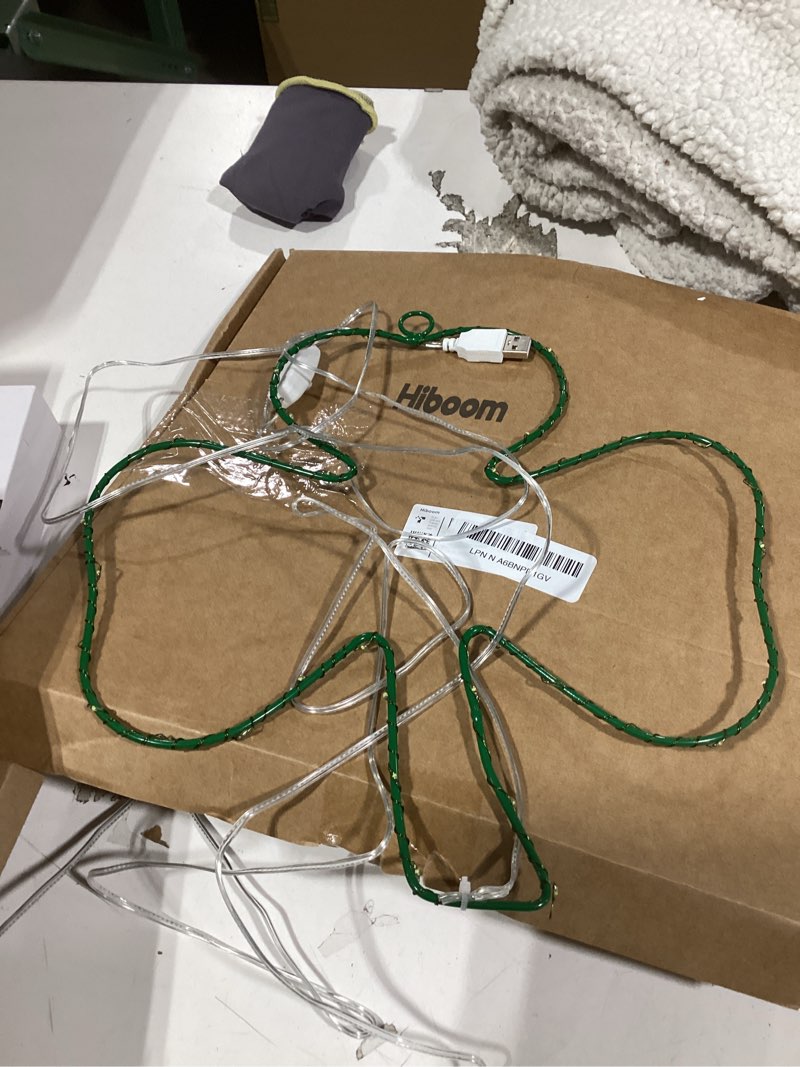 Condition photo showing Good Condition for St. Patrick's Day Light Up Clover Shamrock Window Decoration, 15.8 Inch 40 LED Irish Green Iron Frame Silhouette Lights, Waterproof USB Plug Operated for Holiday Wall Door Glass Decor
