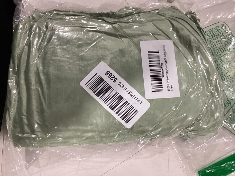 Condition photo showing New/Like New for BEDELITE Velvet Pillow Covers 26x26 with Zipper, 2 Pack Super Soft Square Pillow Covers for Bedroom, Sofa, Luxury Cozy Fleece Pillowcases for All Seasons(26x26 Inches, Sage Green) Sage Green 26" x 26" (Pack of 2)