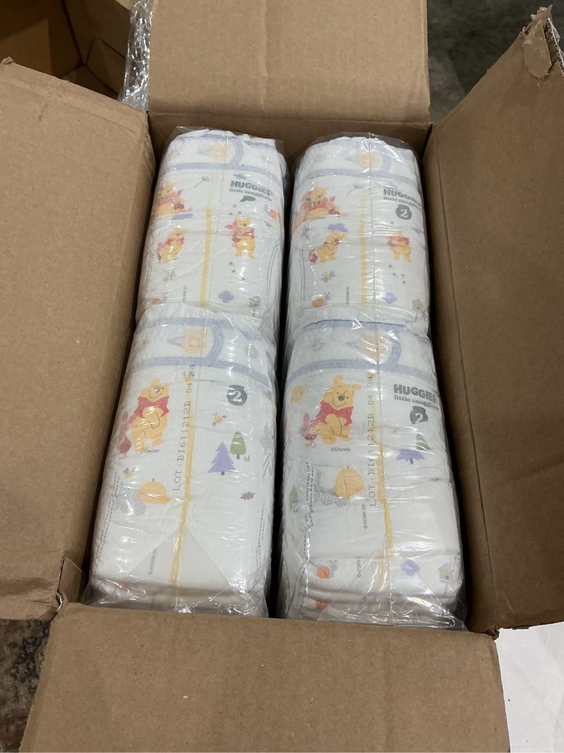 Condition photo showing New/Like New for huggies size 2 diapers, little snugglers baby diapers, size 2 (12-18 lbs), 148 count, packaging may vary size 2 148