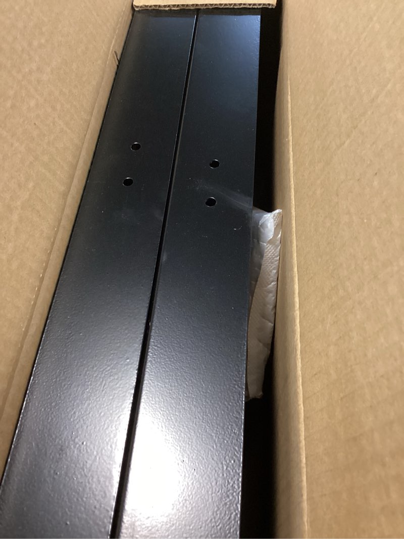 Condition photo showing As Is for upgrade fuel jug holder, black gas can holder for trailer, sturdy four-way support and locking straps, fits two 5 gallon fuel containers, compatible with vp gas can