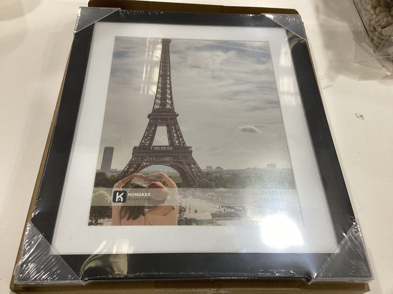Condition photo showing New/Like New for hongkee 10x12 picture frame with glass, display pictures 8x10 with mat or 10 x 12 without mat - wall and tabletop, 10 by 12 photo wooden frames (black, 1 pack) black 10x12 in