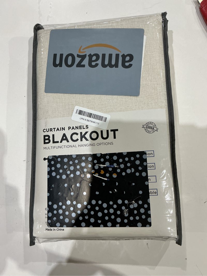 Condition photo showing Good Condition for the product is a set of uozewe blackout curtain panels with multifunctional hanging options.