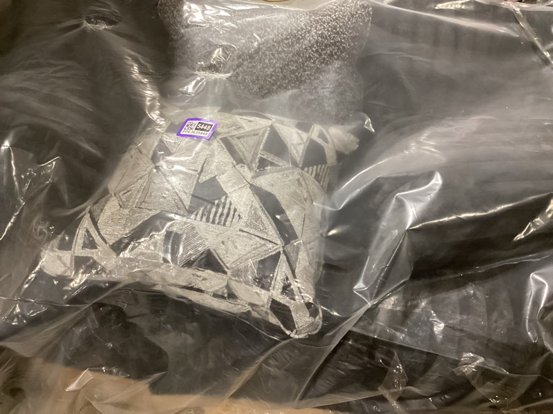 Condition photo showing New/Like New for Signature Design by Ashley Midnight-Madness Modern Anti Sage Sofa with Reversible Cushions, Black Black Sofa