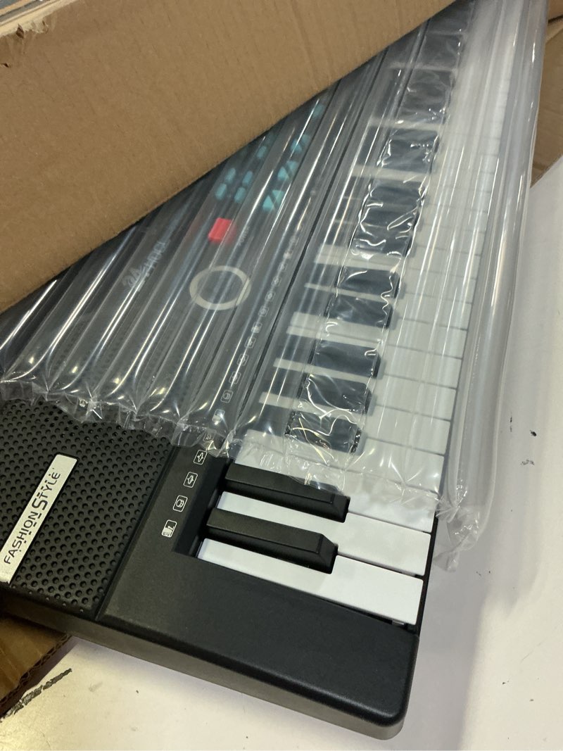 Condition photo showing Good Condition for kids keyboard 61 keys, beginner electronic piano with one-key teaching 100 tones & rhythms, portable music keyboard for children with microphone, music stand [black, piano only] black piano only