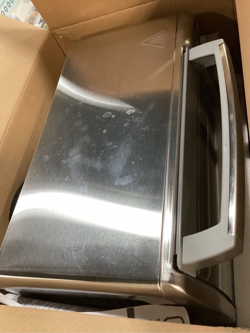 Condition photo showing As Is for BLACK+DECKER 4-Slice Toaster Oven with Natural Convection, Stainless Steel, TO1760SS (TO1760SST-1)