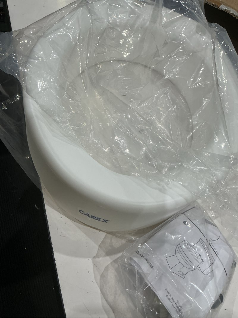Condition photo showing As Is for carex toilet seat riser, round raised toilet seat add, to toilet height, assists with bending or sitting, bolt-on installation under existing toilet seat