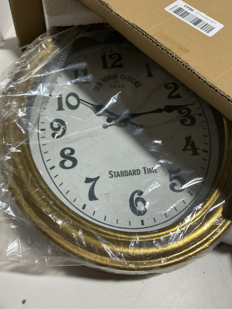 Condition photo showing Good Condition for NIKKY HOME Vintage Wall Clock, European Style Decorative Clock Retro Oval Large Clock Silent Non-Ticking Elegant Home Decor Gold Wall Clocks Battery Operated for Living Room Bedroom Medium