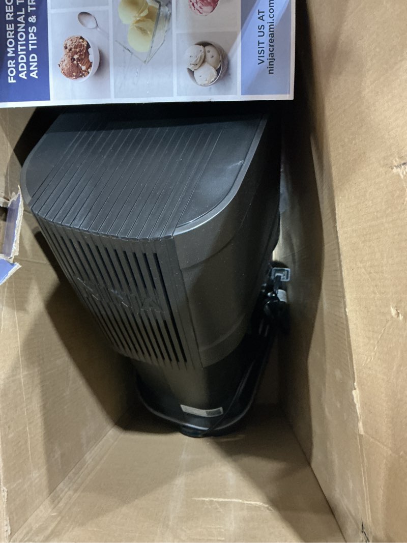 Condition photo showing As Is for ninja creami deluxe ice cream maker, treats and frozen desserts, sorbet, milkshakes, yogurt and more, 11-in-1 programs, xl capacity, includes two 24-oz family-size tubs, silver, nc501
