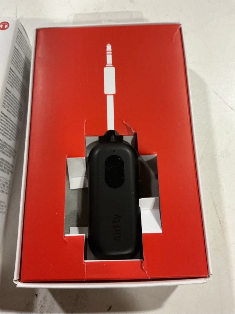 Condition photo showing As Is for twelve south airfly pro bluetooth wireless audio transmitter/receiver for up to 2 airpods/wireless headphones; use with any 3.5 mm audio jack, black airfly pro black