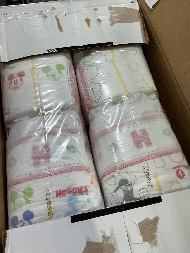 Condition photo showing New/Like New for huggies snug & dry diapers size 4, 92 count size 4 92