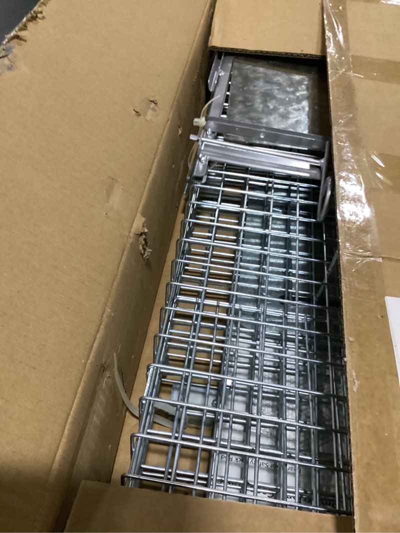 Condition photo showing As Is for 32" humane animal cage trap, live animal cage trap, folding animal trap for stray cats, raccoons, rabbits, skunks, moles, groundhogs and armadillos up to 17 lbs