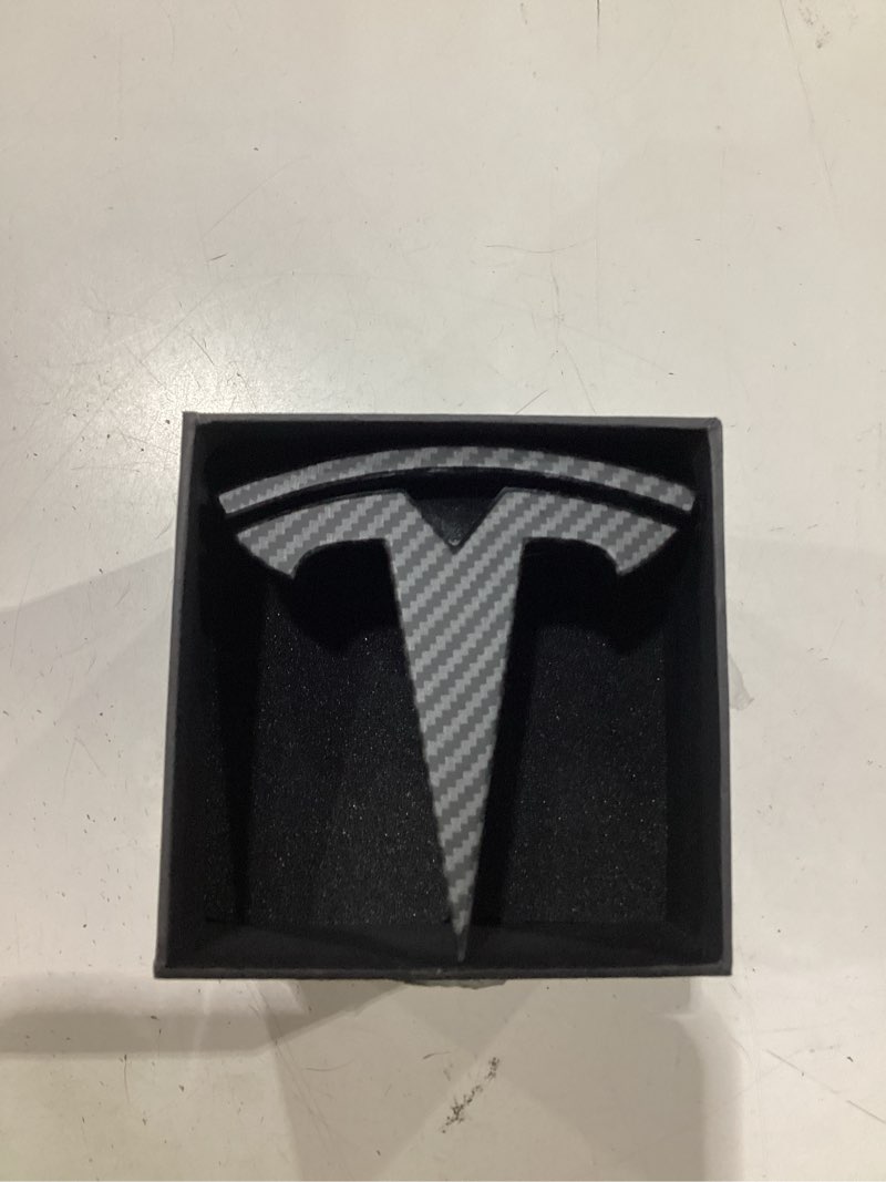 Condition photo showing New/Like New for front hood/grille bright emblem logo compatible with tesla model x - matte carbon fiber pattern 1 piece c6. matte model x