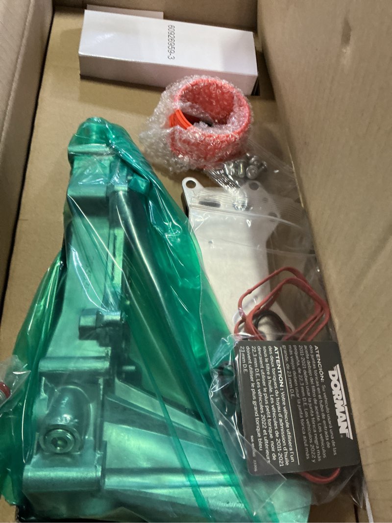 Condition photo showing New/Like New for dorman 926-959 patented upgraded aluminum engine oil filter housing with oil cooler and filter compatible with select models (oe fix)