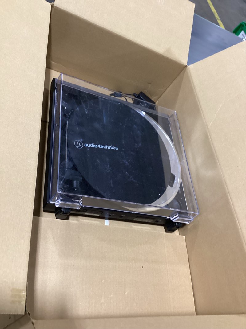 Condition photo showing As Is for audio-technica at-lp60x-gm fully automatic belt-drive stereo turntable, gunmetal/black, hi-fidelity, plays 33-1/3 and 45 rpm vinyl records, dust cover, anti-resonance, die-cast aluminum platter gunmetal/black wired turntable