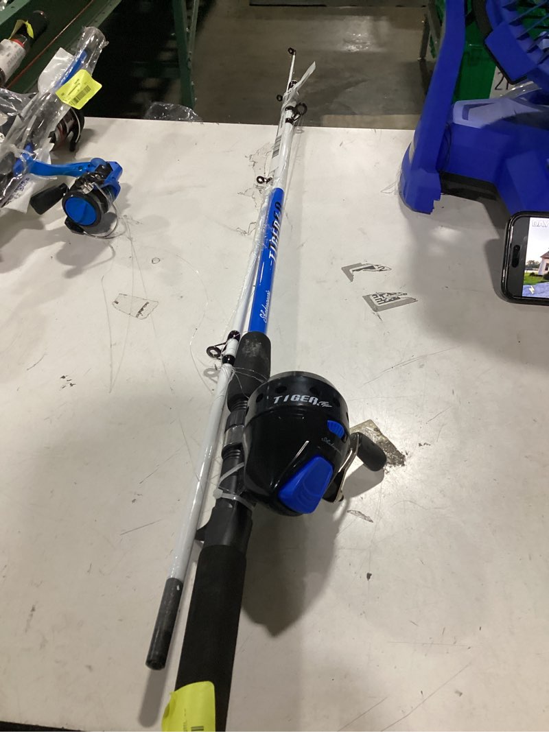 Condition photo showing As Is for shakespeare tiger spincast combo, 6'6" medium heavy fishing rod, 15 size reel