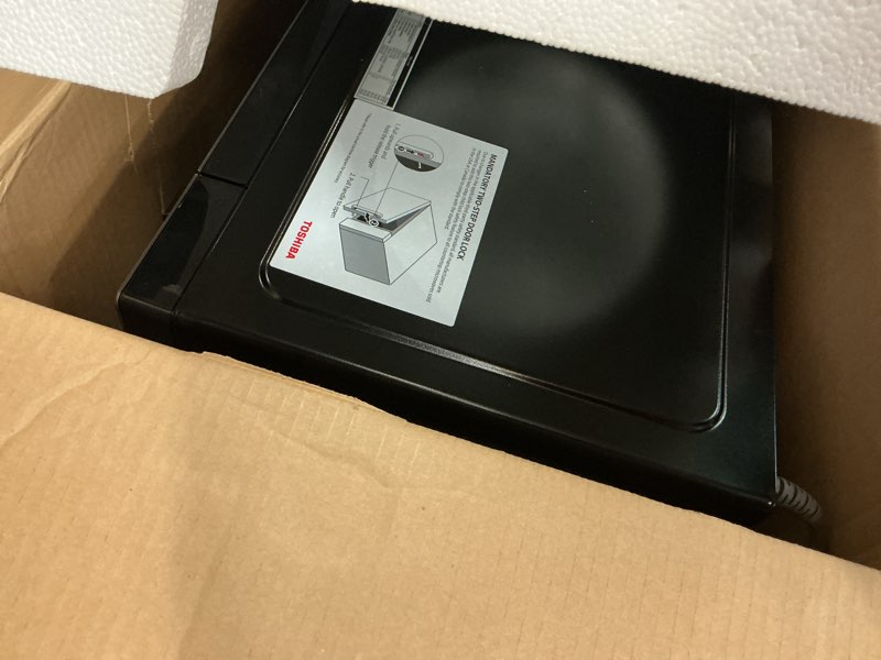 Condition photo showing As Is for TOSHIBA EM131A5C-BS Countertop Microwave Ovens 1.2 Cu Ft, 12.4" Removable Turntable Smart Humidity Sensor 12 Auto Menus Mute Function ECO Mode Easy Clean Interior Black Color 1000W 1.2 Cu.ft