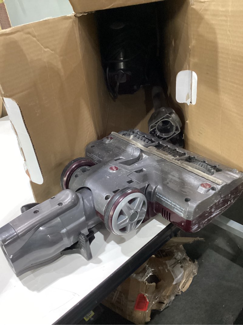 Condition photo showing As Is for USED NOT TESTED Shark HV322 Rocket Pet Plus Corded Stick Vacuum with LED Headlights, XL Dust Cup, Lightweight, Perfect for Pet Hair Pickup, Converts to a Hand Vacuum, with (2) Pet Attachments, Bordeaux/Silver Rocket Deluxe w/ headlights