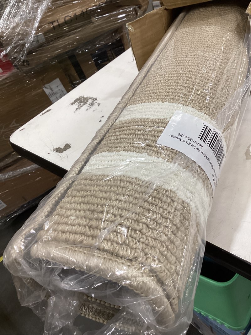 Condition photo showing Good Condition for laura ashley all loop tufted 26" x 45" washable skid-resistant accent rug - berber/ivory debbie double border two-tone debbie double border two-tone berber/ivory 2'2" x 3'9" (rectangular)