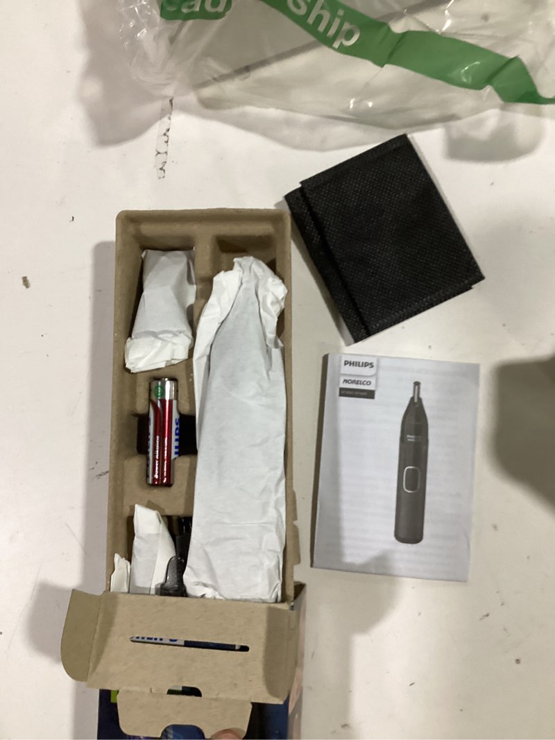 Condition photo showing Good Condition for Norelco Philips Nose Trimmer 5000 for Nose, Ears, Eyebrows Trimming Kit, NT5600/62 Black, Silver 7.9 Inch (Pack of 1)