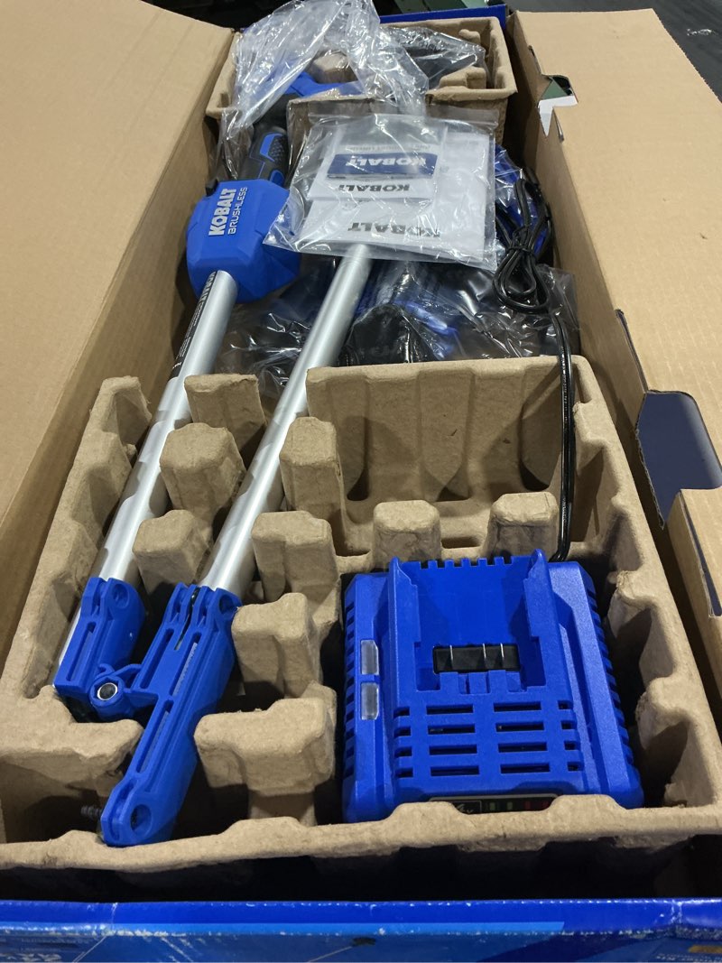 Condition photo showing As Is for kobalt 24-volt 14-in straight shaft battery string trimmer 4.0 ah (battery included) (charger included)