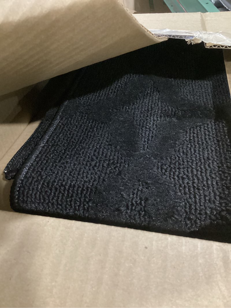 Condition photo showing As Is for garland rug sparta non slip polypropylene 3 ft. x 5 ft. black area rug- ideal for living rooms & hallways, stylish & durable for high traffic areas black 3' x 5' (rectangular)