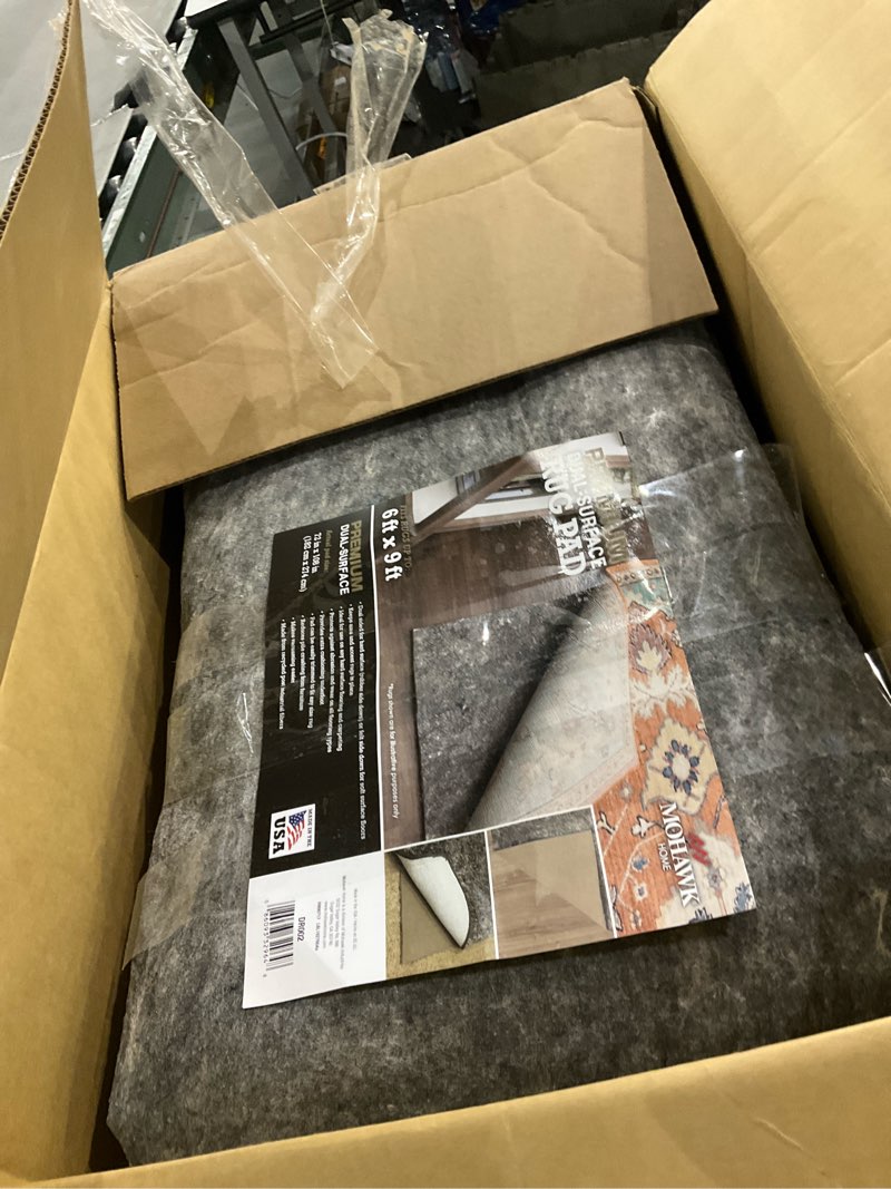Condition photo showing Good Condition for Mohawk Home 6' x 9' Non Slip Rug Pad Gripper 1/4 Thick Dual Surface Felt + Rubber Gripper - Safe for All Floors, Synthetic Fiber, Brown