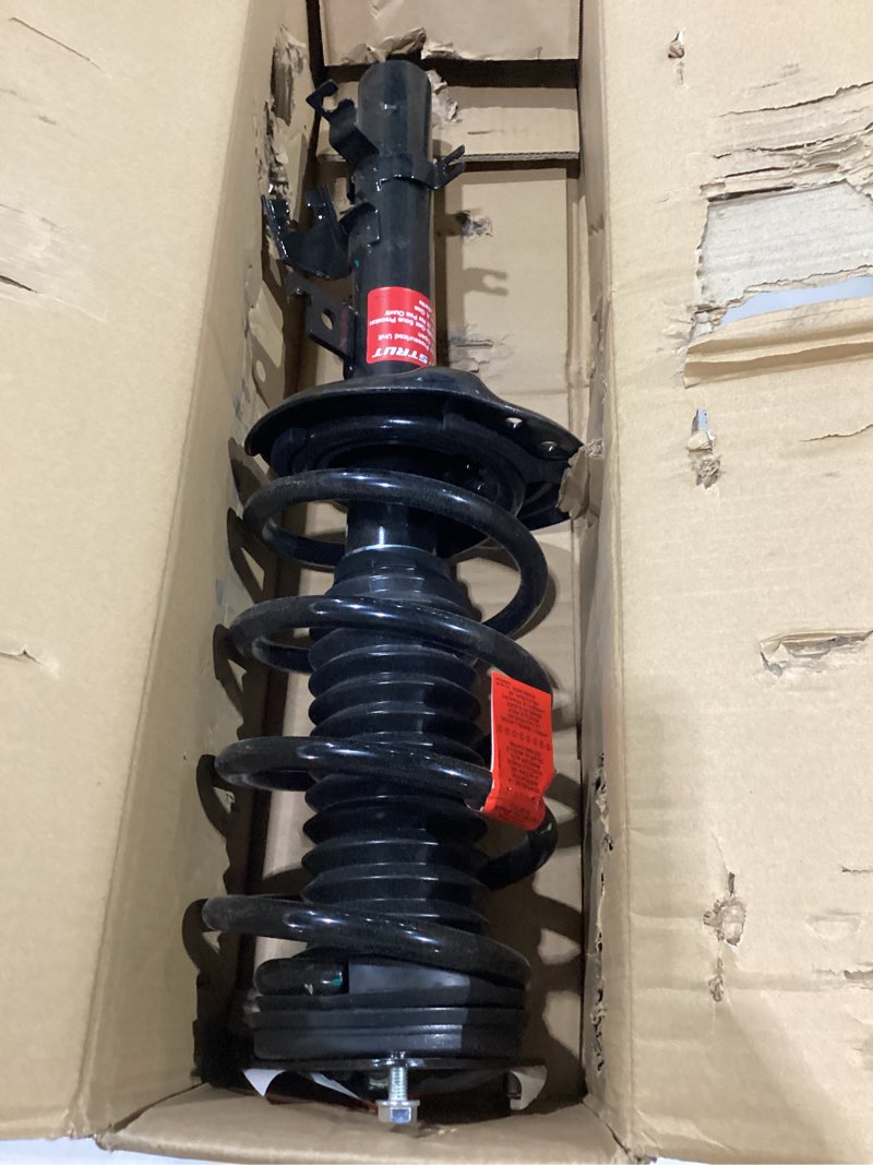 Condition photo showing New/Like New for monroe quick-strut 273074 suspension strut and coil spring assembly for nissan rogue