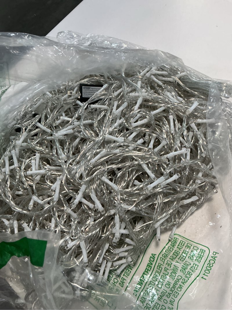 Condition photo showing As Is for 100ft warm white string lights – 300 led extra long waterproof fairy lights on clear wire, plug-in indoor outdoor decorations for christmas, wedding, patio, bedroom, party 100ft, warm white