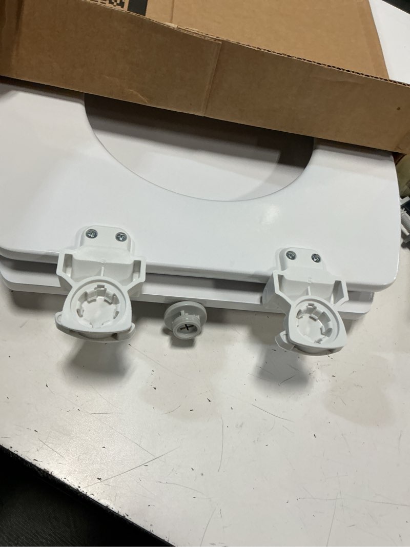 Condition photo showing Good Condition for mayfair cameron? elongated enameled wood toilet seat in white with sta-tite? seat fastening system? and easy•clean? hinge