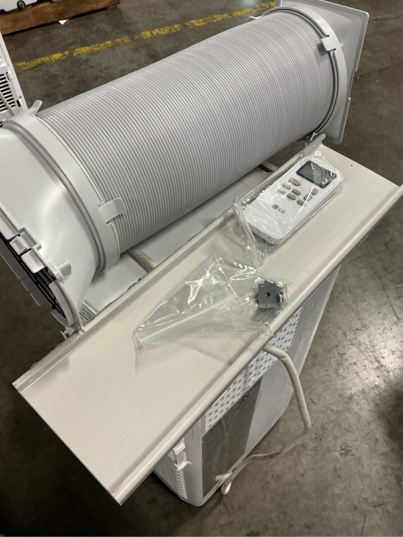 Condition photo showing As Is for 6,000 btu (sacc) / 8,765 btu (ashrae) portable air conditioner | cools up to 250 sq. ft.