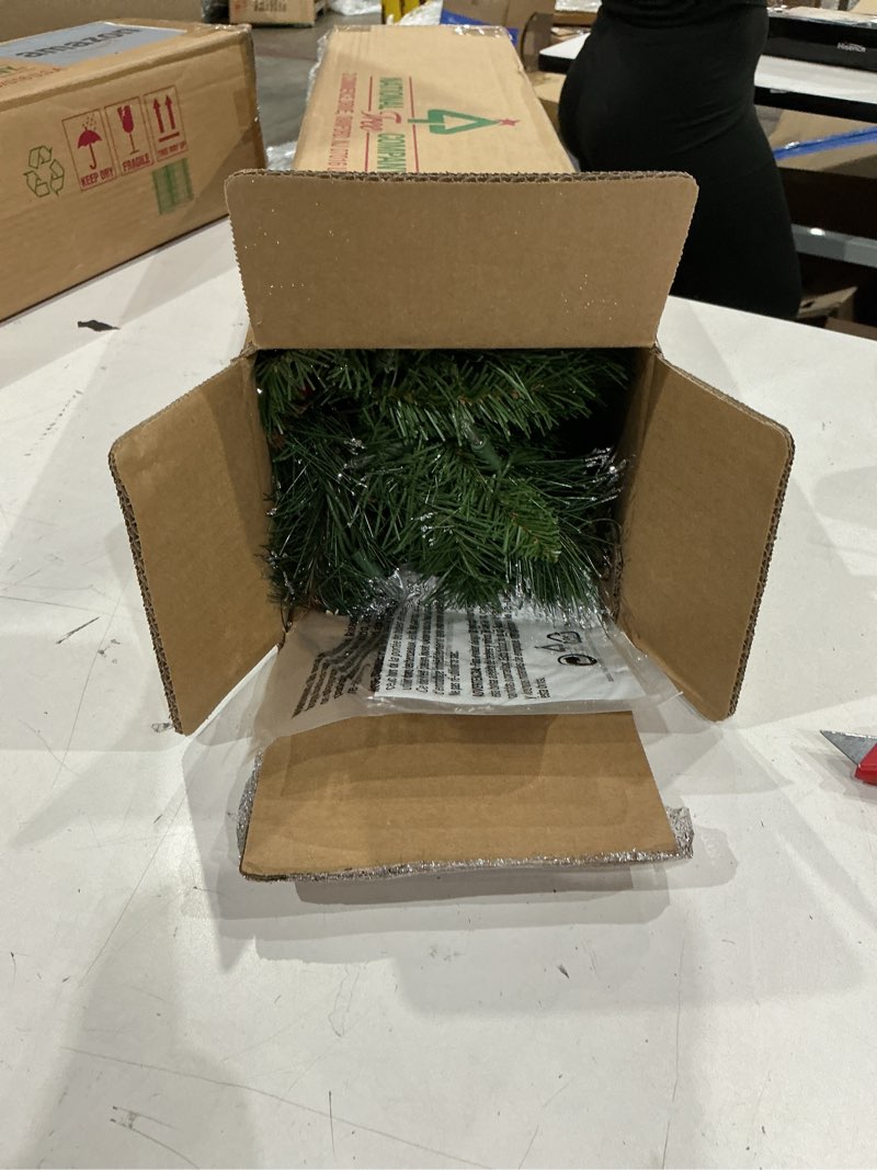 Condition photo showing New/Like New for national tree company 9 ft pre-lit crestwood spruce artificial christmas garland, christmas decoration with glitter, pinecones, red berries, 50 clear lights, 180 tips, green plug in tree