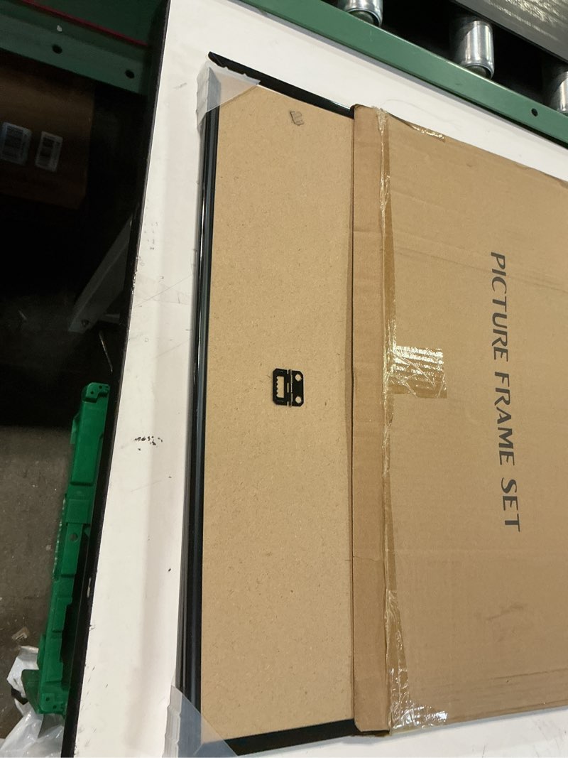 Condition photo showing As Is for upsimples 20x30 Picture Frame Black 3 Pack, Scratch-Proof Poster Frames 20 x 30 for Photo Gallery - Slide-In Strips, Horizontal or Vertical Wall Mounting Black 20x30