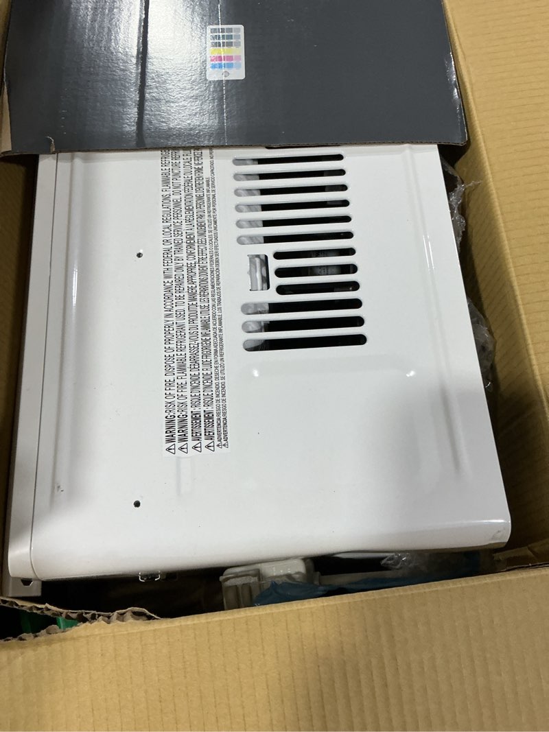 Condition photo showing Good Condition for 5,000 btu 115-volt window air conditioner 150 sq. ft. rooms with remote in white