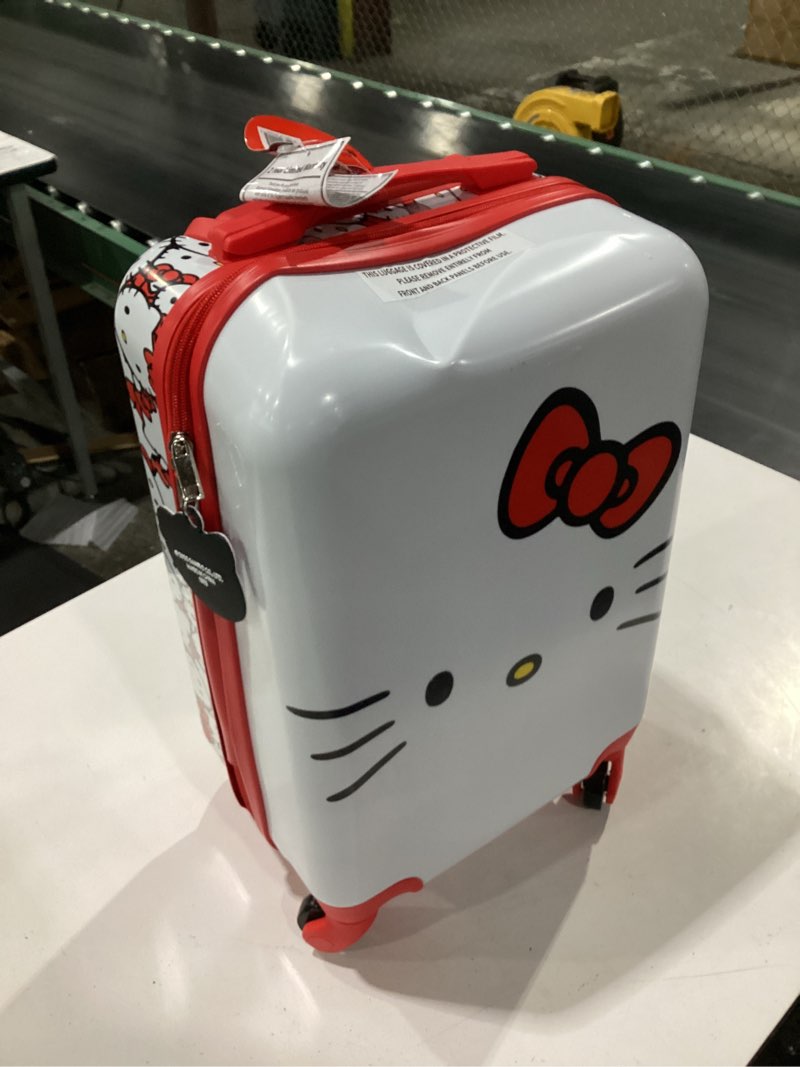 Condition photo showing Good Condition for hello kitty hardside carry on spinner suitcase - red/white