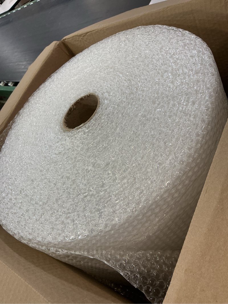 Condition photo showing New/Like New for amazon basics bubble wrap for moving, packing, shipping and storage, perforated protective cushioning for fragile items, 12-inch x 175-ft long roll, small 3/16", clear