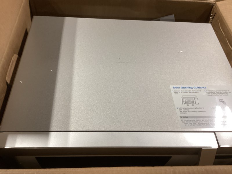 Condition photo showing Good Condition for Farberware 1.3 Cu. Ft. Countertop Microwave Oven – 1100 Watts Power, Smart Sensor Auto Cook Settings, Defrost, Easy Clean and Child Safety Lock - White Platinum 1.3 Cu. Ft White Platinum